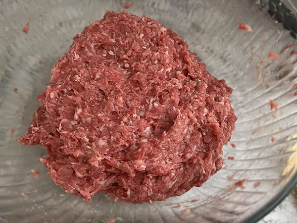 Combination of meats and spices for homemade skinless sausages.