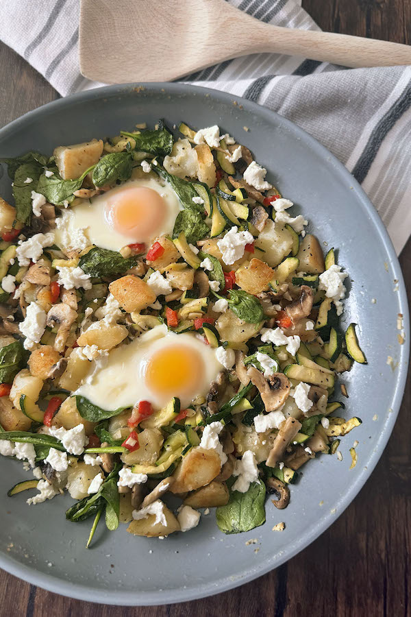 Breakfast Skillet with Potatoes, Zucchini and Mushrooms.