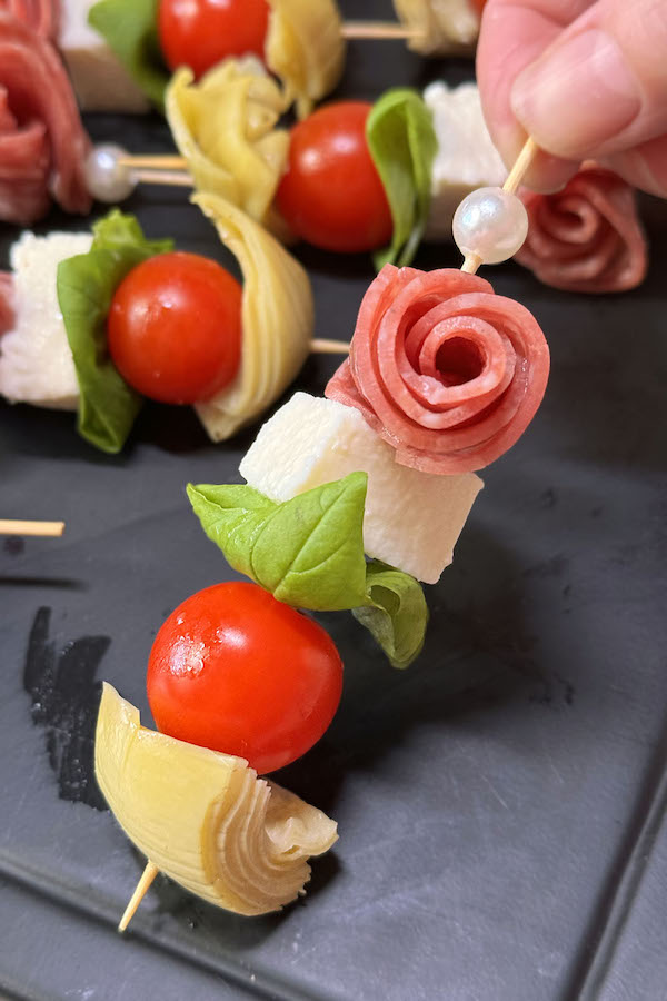 Easy Caprese Skewer Bites Recipe with Salami & Artichokes