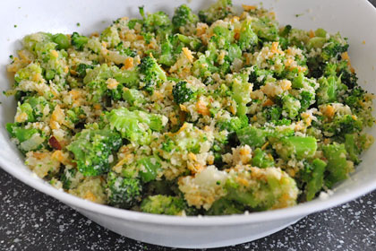 Patties mixture of broccoli, eggs, cheese, onion and garlic in a bowl.